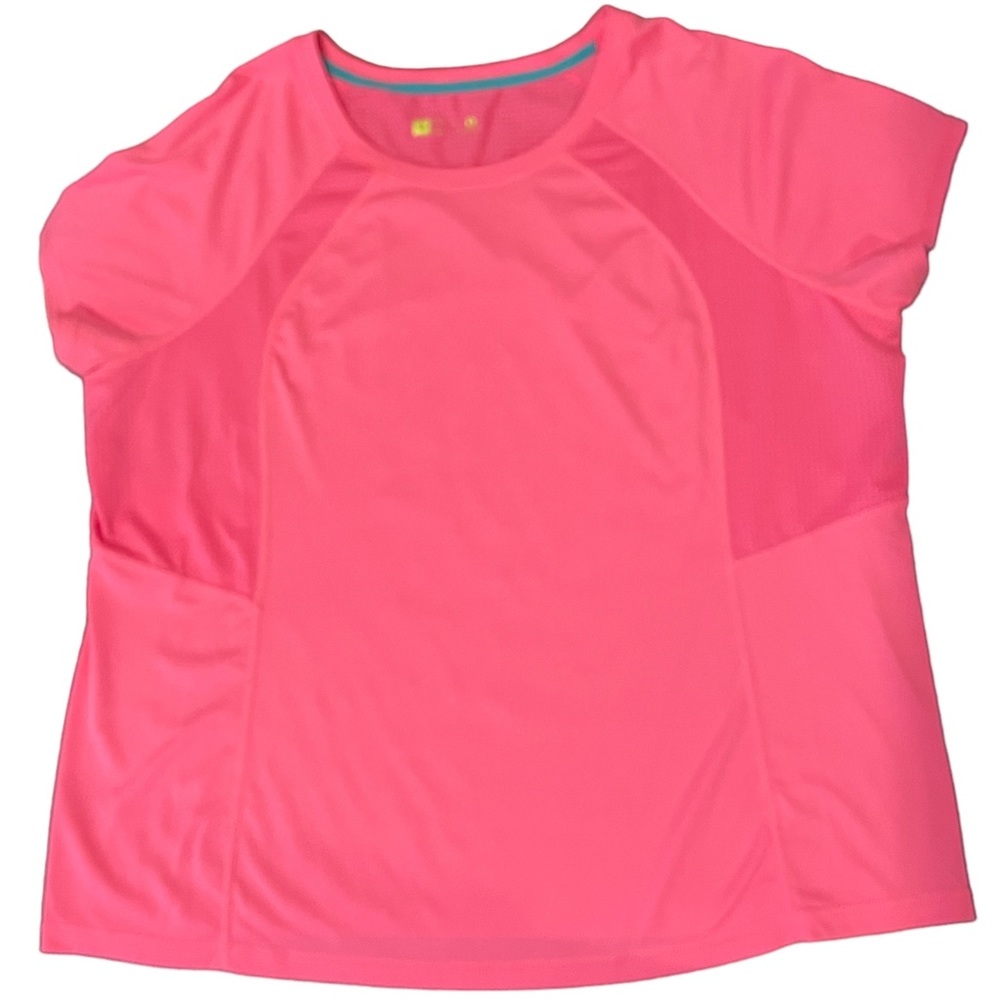 Woman’s pink work out shirt. Parts of the shirt has vents we area.